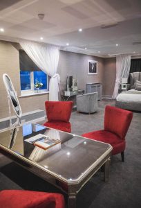 Spacious room with seating area and King size bed